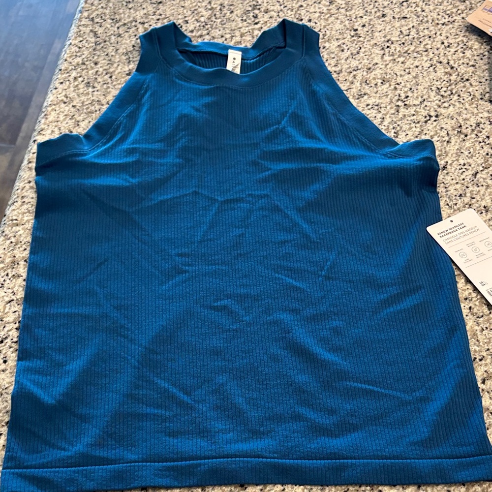 Athleta Renew Seamless Tank Top. New with tags. Dark teal blue cooor.